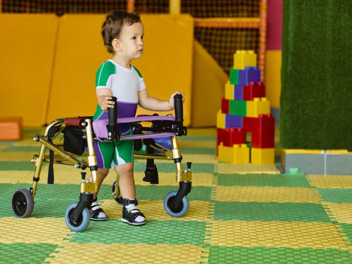 A child using a pediatric Gait Walker 