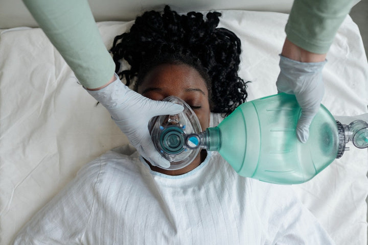 Providing Medical Oxygen Assistance to Patient in Bed